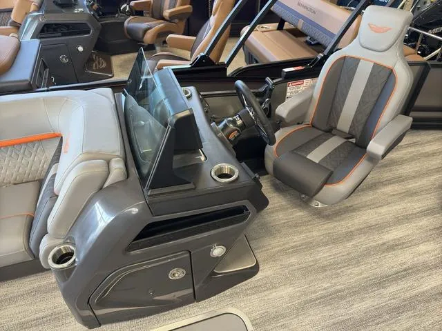 Slide: The Image of 2025 Bennington 22ML Cruise boat interior with modern helm and stylish seating. - 28