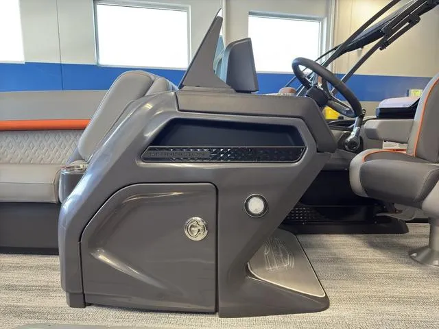 Slide: The Image of 2025 Bennington 22ML Cruise boat interior with modern helm and seating. - 46