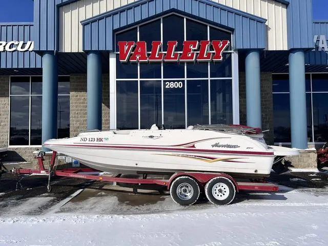 Slide: The Image of 2005 Hurricane FUNDECK202 boat on trailer outside Vallely dealership. - 1