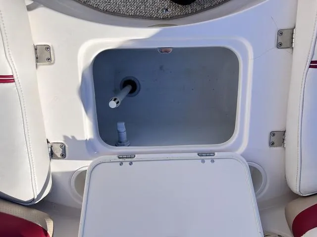 Slide: The Image of Open storage compartment on a 2005 Hurricane FUNDECK202 boat. - 20