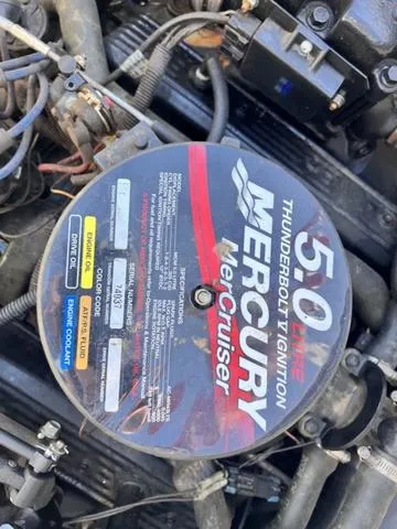 Slide: The Image of Engine cover of a 2005 Hurricane FUNDECK202 with Mercury MerCruiser 5.0 Thunderbolt Ignition. - 24