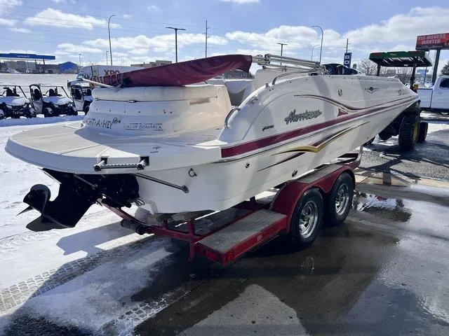 Slide: The Image of 2005 Hurricane FUNDECK202 boat on trailer in snowy outdoor setting. - 6