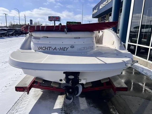 Slide: The Image of 2005 Hurricane FUNDECK202 boat on trailer, rear view, snowy outdoor setting. - 7