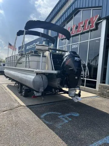 Slide: The Image of 2015 Godfrey 2500 FE BAR pontoon boat parked outside dealership. - 3