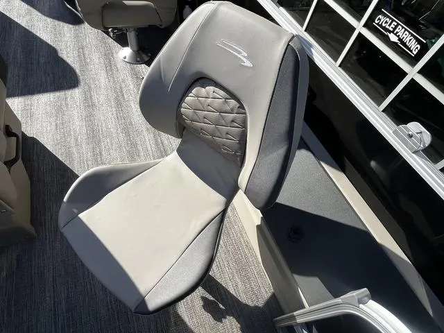 Slide: The Image of 2025 Bennington 22SF Tri-Toon Pontoon seat with modern design and quilted backrest. - 13