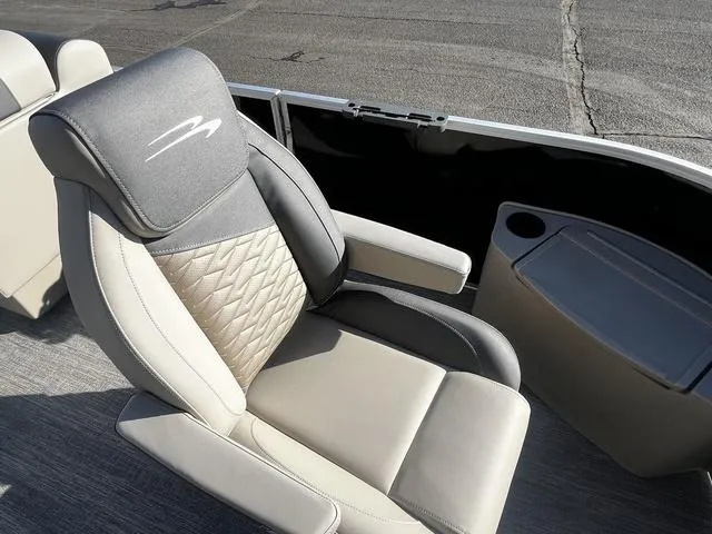 Slide: The Image of Luxurious seating on 2025 Bennington 22SF Tri-Toon Pontoon with quilted design and armrest. - 17