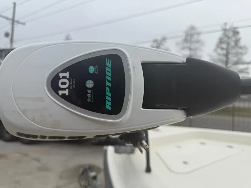 Slide: The Image of Riptide motor on 2012 ShearWater 25LTZ boat, close-up view. - 16