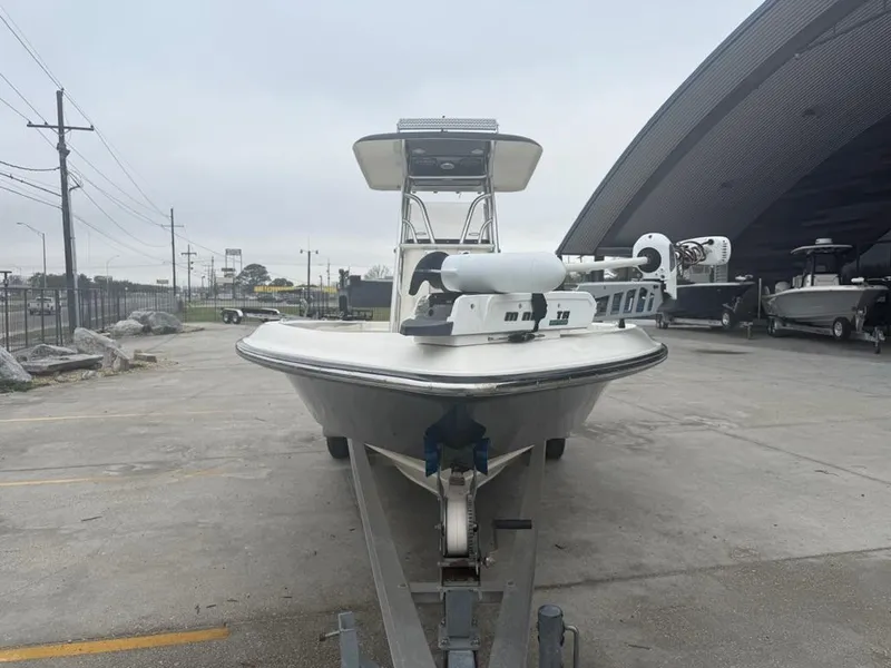 Slide: The Image of 2012 ShearWater 25LTZ boat on trailer in outdoor storage area. - 5