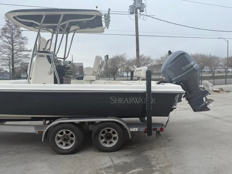 Slide: The Image of 2012 ShearWater 25LTZ boat on trailer with Yamaha outboard motor. - 7