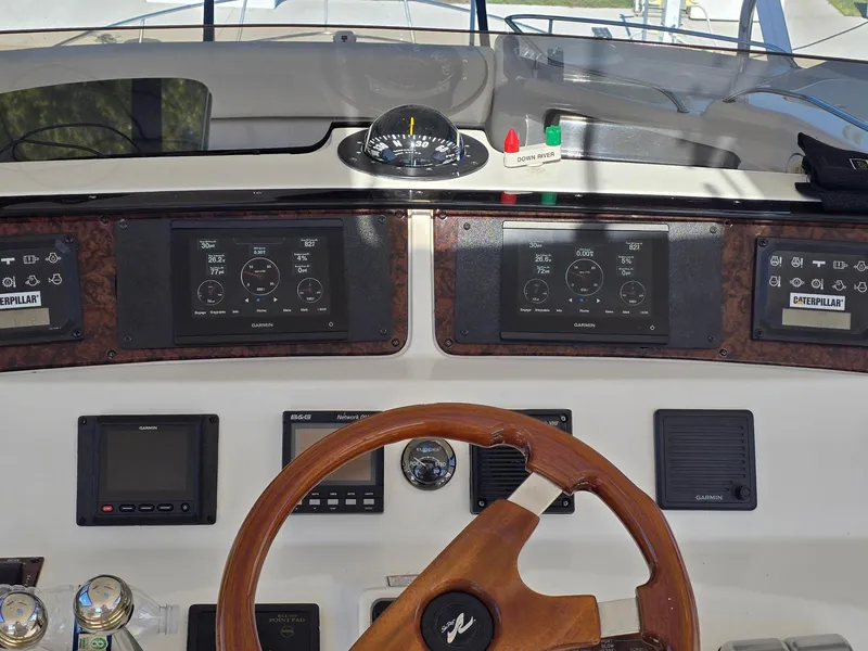 Slide: The Image of Control panel of a 2002 Sea Ray 560 Sedan Bridge yacht. - 13