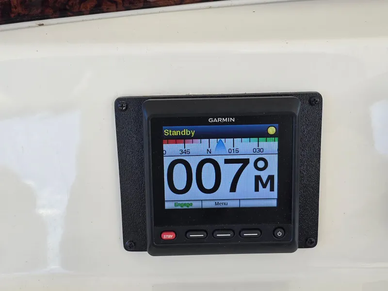 Slide: The Image of Garmin navigation display on 2002 Sea Ray 560 Sedan Bridge, showing heading 007 degrees. - 14
