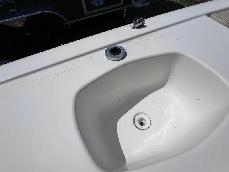 Slide: The Image of 2017 NauticStar 203SC Sport Deck boat sink with clean white basin. - 20
