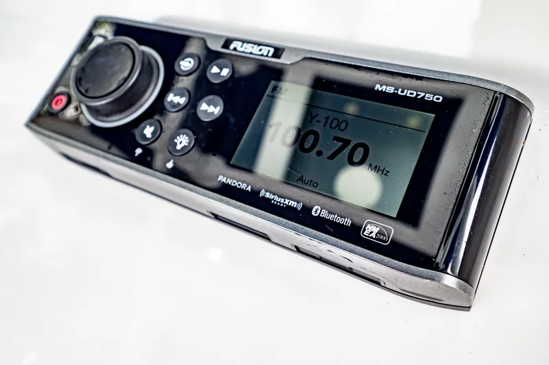 Slide: The Image of Fusion MS-UD750 marine stereo system with digital display, featuring Bluetooth and Pandora connectivity. - 27