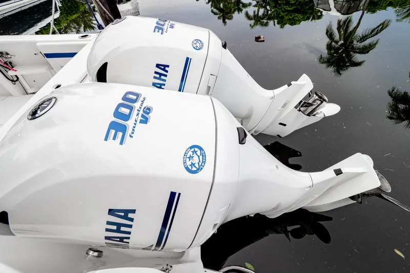 Slide: The Image of Twin Yamaha 300 outboard engines on a 2018 Intrepid 327 Center Console boat. - 3