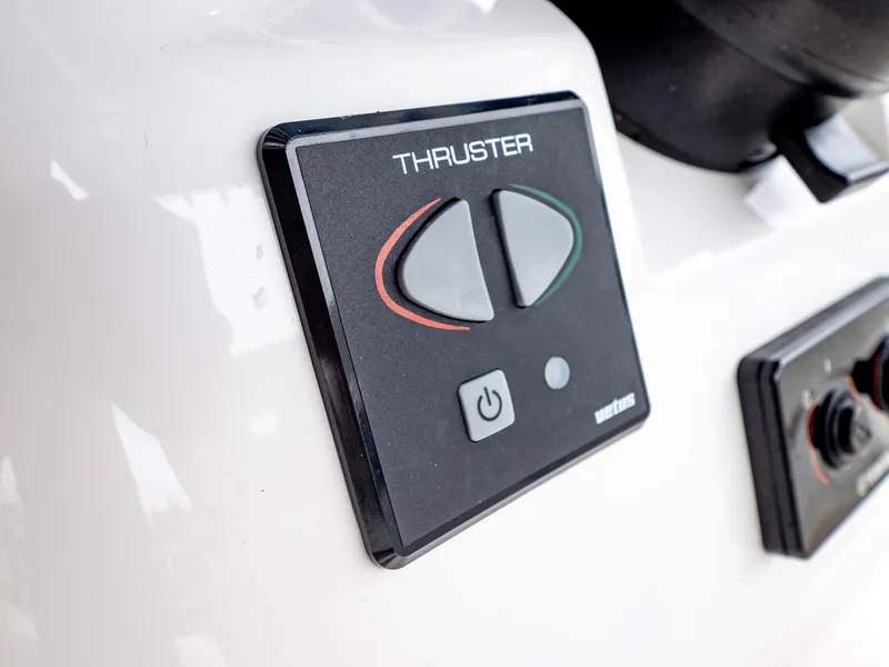 Slide: The Image of Control panel of 2018 Intrepid 327 Center Console boat thruster system. - 30