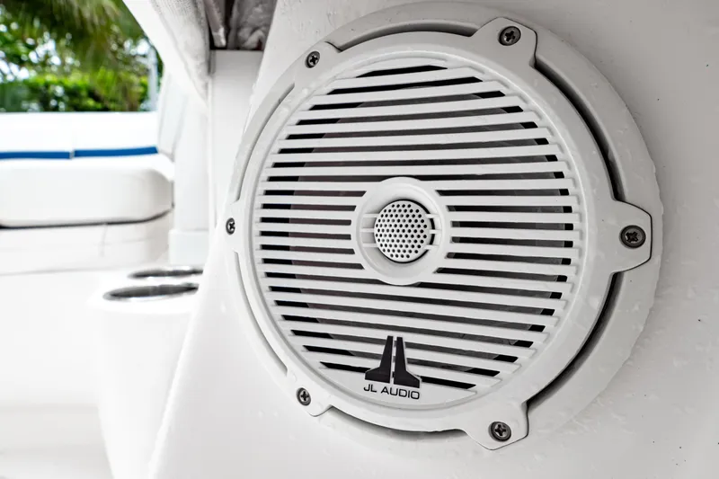 Slide: The Image of Close-up of JL Audio speaker on 2018 Intrepid 327 Center Console boat. - 36