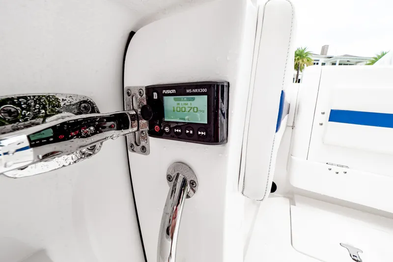 Slide: The Image of 2018 Intrepid 327 Center Console boat with Fusion MS-RA70N stereo system. - 44