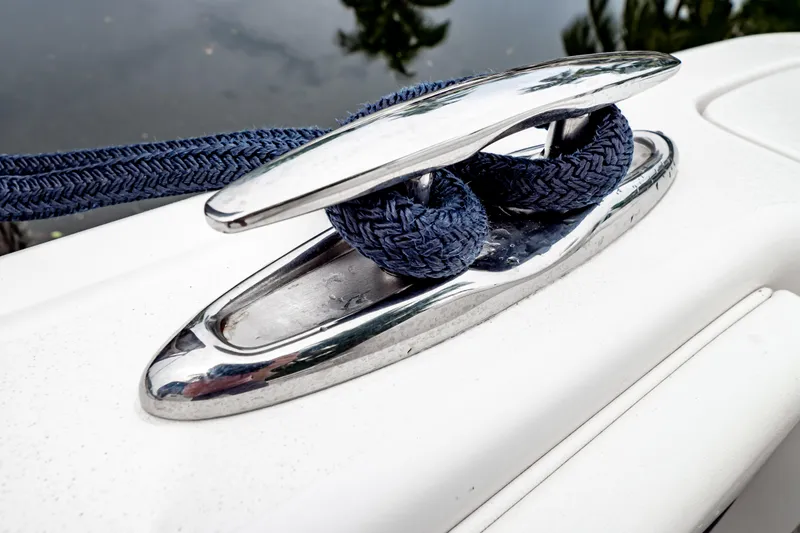 Slide: The Image of Chrome cleat with blue rope on 2018 Intrepid 327 Center Console boat. - 46