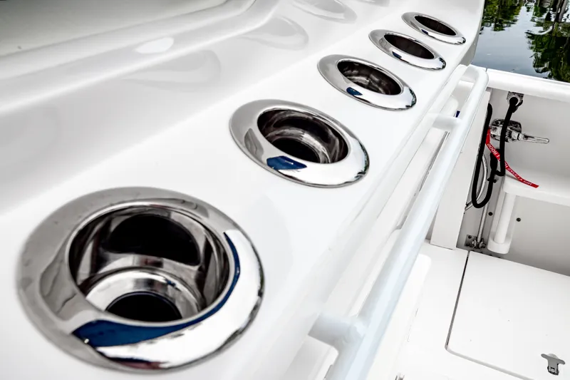 Slide: The Image of 2018 Intrepid 327 Center Console boat with stainless steel cup holders. - 47