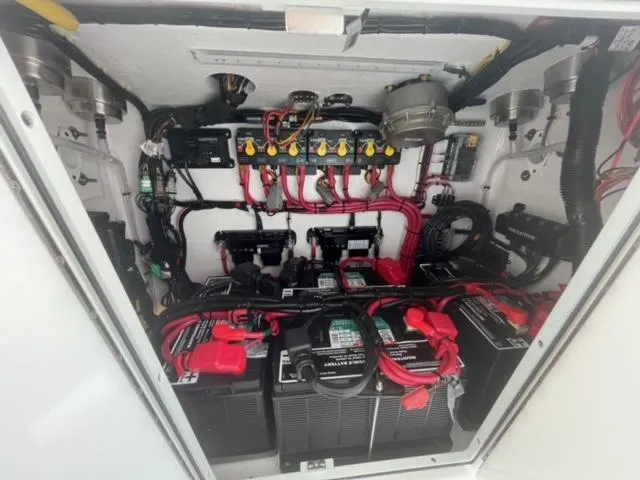 Slide: The Image of 2025 Contender 35 ST electrical system with batteries and wiring. - 16