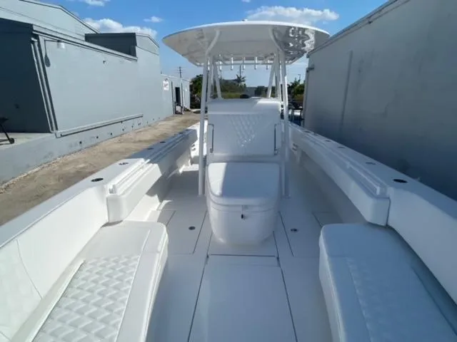 Slide: The Image of 2025 Contender 35 ST boat with spacious seating and sleek design. - 21