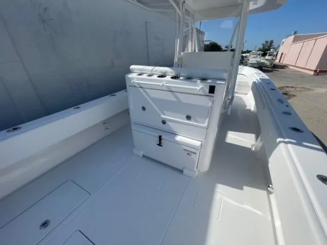Slide: The Image of 2025 Contender 35 ST boat interior, featuring spacious deck and seating area. - 9