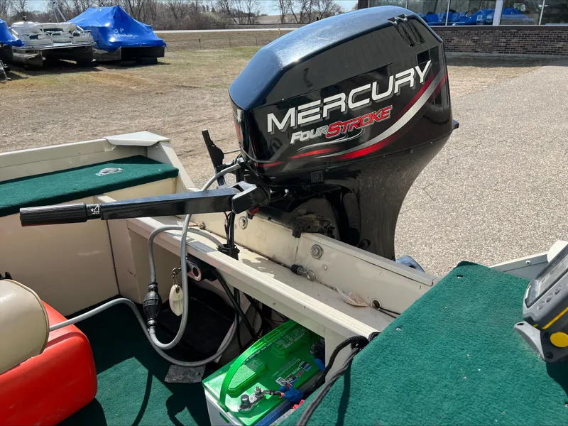 Slide: The Image of 2000 Alumacraft V 16 LTD boat with Mercury FourStroke outboard motor. - 6