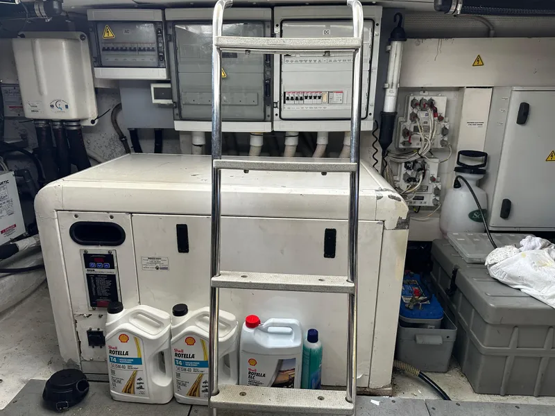 Slide: The Image of Engine room of 2008 Azimut 62 Evolution yacht with maintenance supplies and equipment. - 29