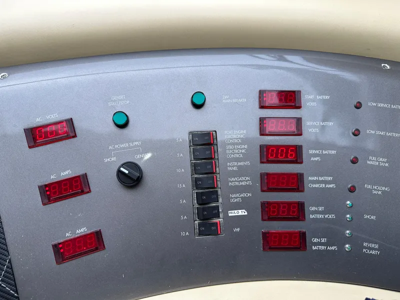 Slide: The Image of Control panel of a 2008 Azimut 62 Evolution yacht with digital displays and switches. - 47