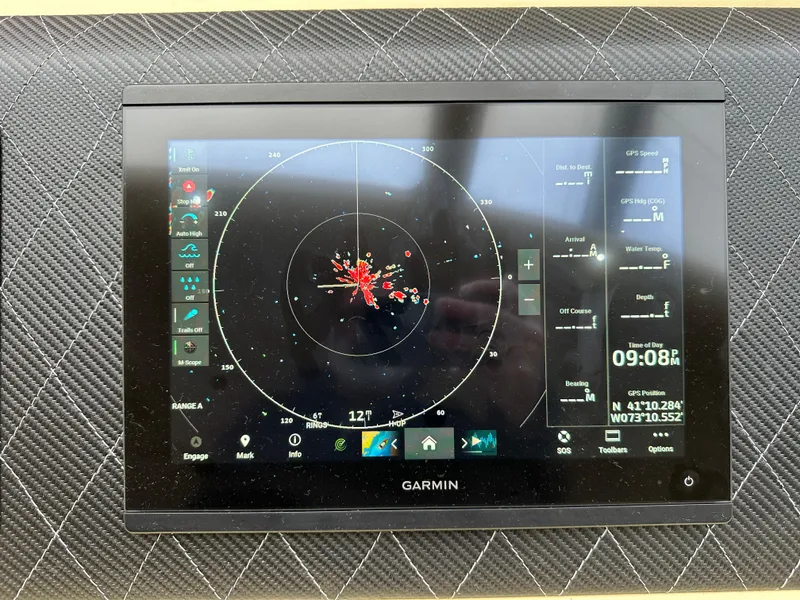 Slide: The Image of Garmin navigation display on 2008 Azimut 62 Evolution yacht dashboard, showing radar and coordinates. - 48