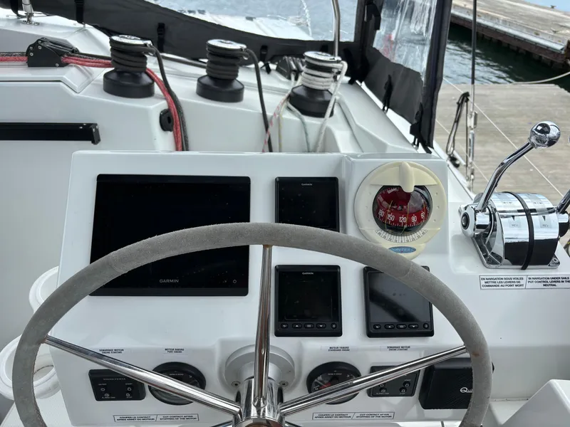 Slide: The Image of Steering wheel and controls of 2022 Fountaine Pajot Astrea 42 catamaran. - 16