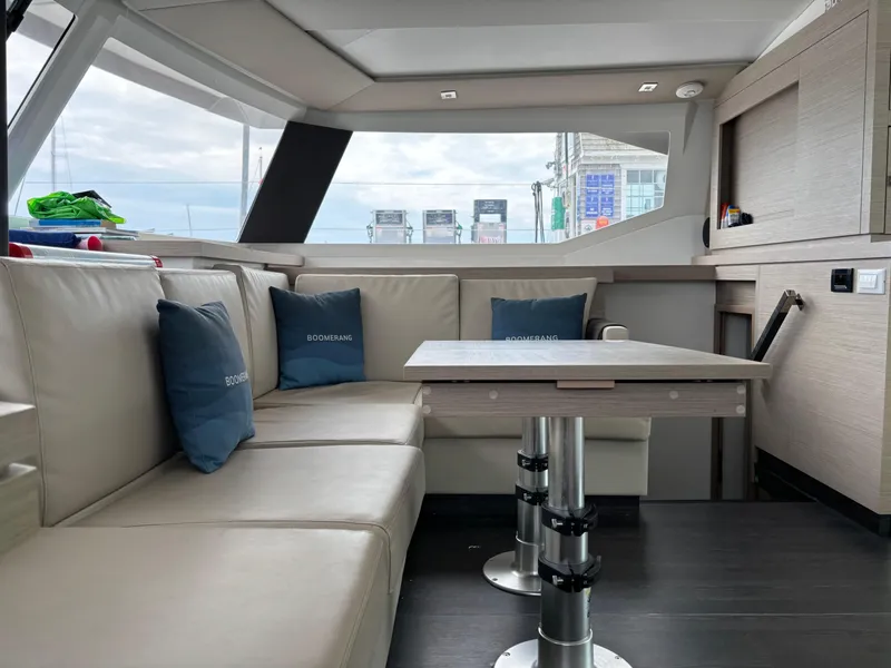 Slide: The Image of Luxurious interior of 2022 Fountaine Pajot Astrea 42 catamaran with modern seating and table. - 27