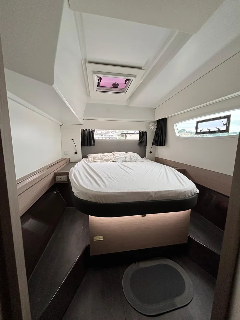 Slide: The Image of 2022 Fountaine Pajot Astrea 42 cabin with bed, skylight, and modern interior design. - 31