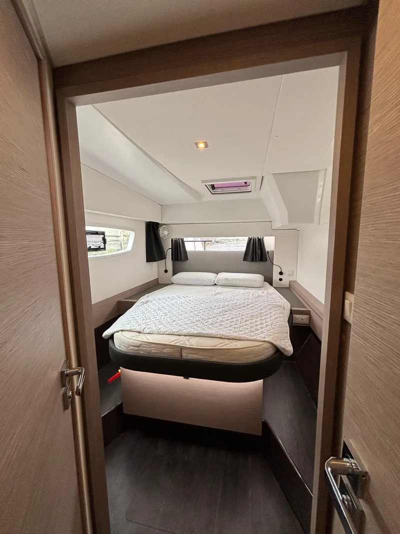 Slide: The Image of 2022 Fountaine Pajot Astrea 42 cabin interior with bed and modern design. - 35