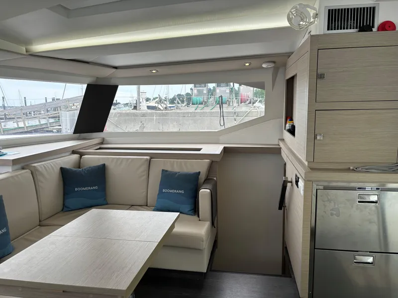 Slide: The Image of Luxurious interior of 2022 Fountaine Pajot Astrea 42 catamaran with modern seating and cabinetry. - 40