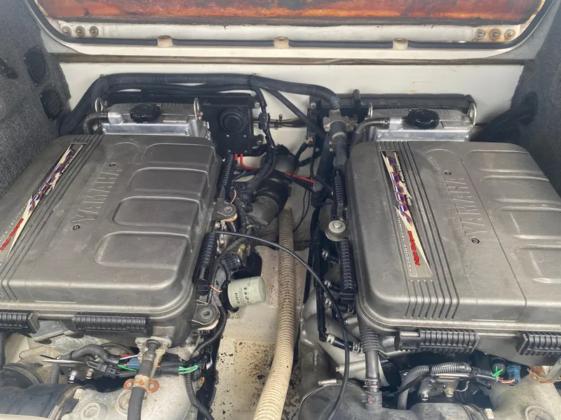 Slide: The Image of 2006 Yamaha Boats SX230 HO engine compartment with dual engines and visible components. - 12
