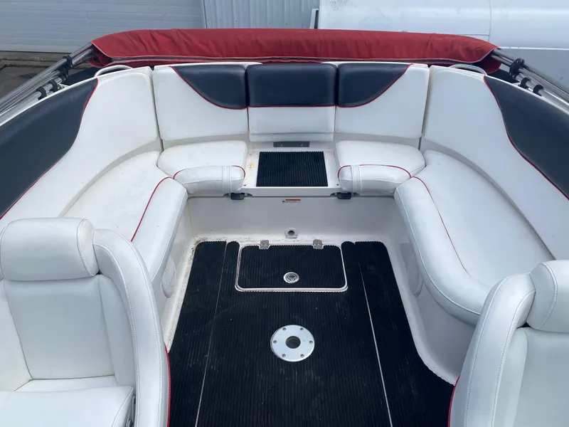 Slide: The Image of 2006 Yamaha Boats SX230 HO interior with white seating and red accents. - 8