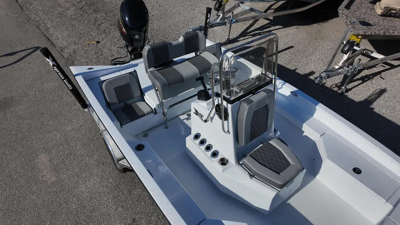 Slide: The Image of 2025 Xpress H20B boat with sleek design and modern seating arrangement. - 26