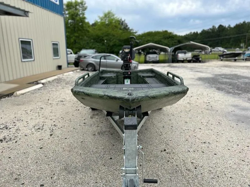 Slide: The Image of 2025 Gator Tail 1750 MID DECK SAVAGE boat on trailer, parked outdoors. - 3