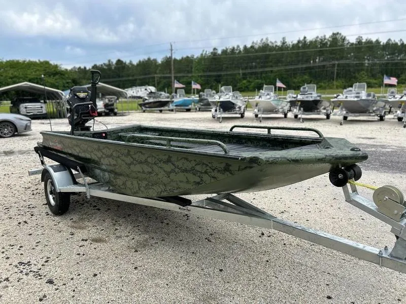 Slide: The Image of 2025 Gator Tail 1750 MID DECK SAVAGE boat on trailer, parked outdoors. - 4