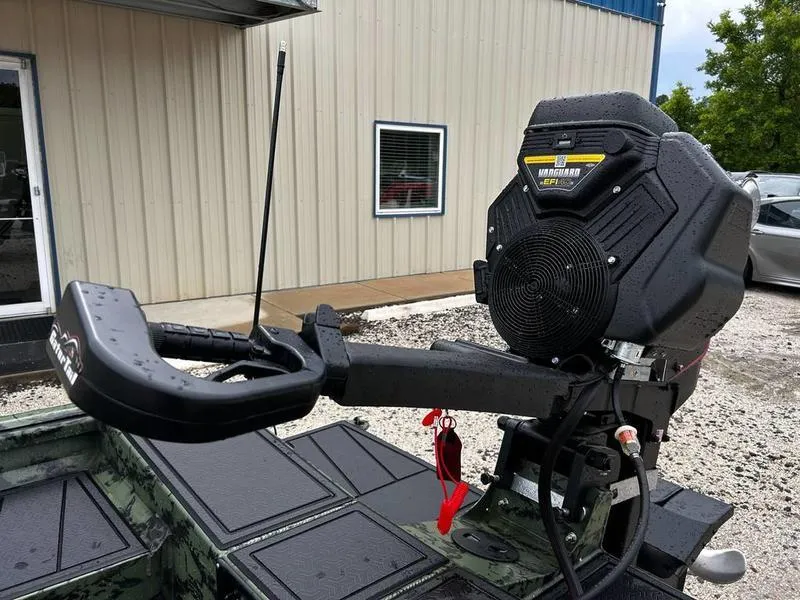 Slide: The Image of 2025 Gator Tail 1750 MID DECK SAVAGE boat motor, outdoor setting, close-up view. - 8