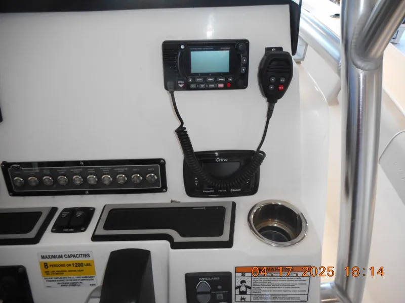 Slide: The Image of Control panel of 2020 Sea Fox 228 Commander boat with radio and switches. - 7
