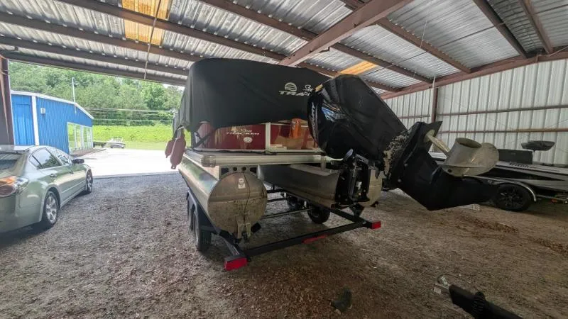 Slide: The Image of 2023 Sun Tracker Party Barge 20 DLX pontoon boat in covered storage. - 27