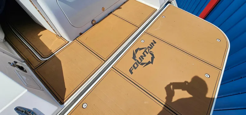 Slide: The Image of 2002 Fountain 38 Express Cruiser deck with logo and shadow. - 48