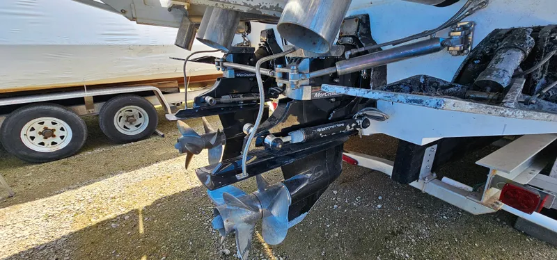 Slide: The Image of 2002 Fountain 38 Express Cruiser propellers and stern view on trailer. - 49