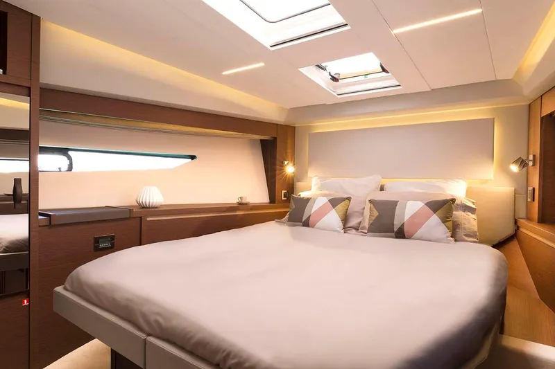 Slide: The Image of Luxurious cabin interior of 2019 Prestige 520S yacht with modern design and cozy bedding. - 15