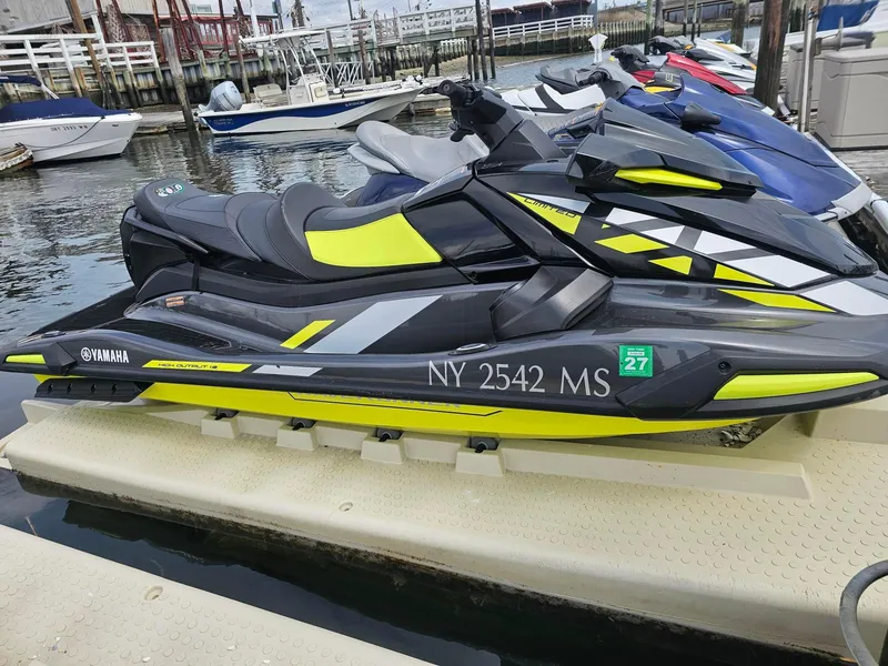 Slide: The Image of 2021 Yamaha WaveRunner VX Limited Ho jet ski docked at marina. - 5