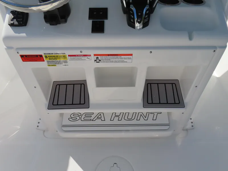 Slide: The Image of 2024 Sea Hunt Gamefish 25 console with branded step and controls. - 29