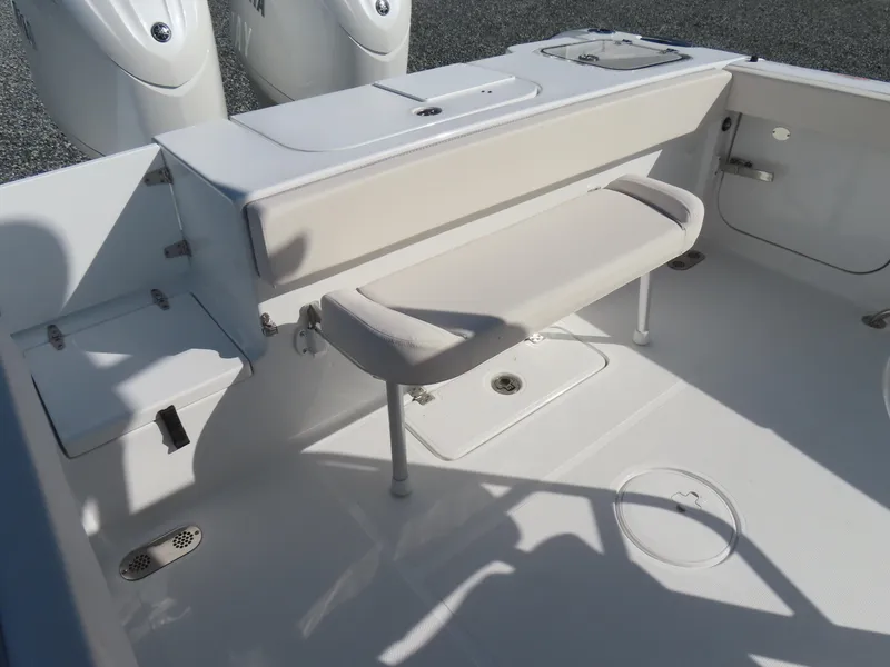 Slide: The Image of 2024 Sea Hunt Gamefish 25 boat interior with seating and storage compartments. - 32