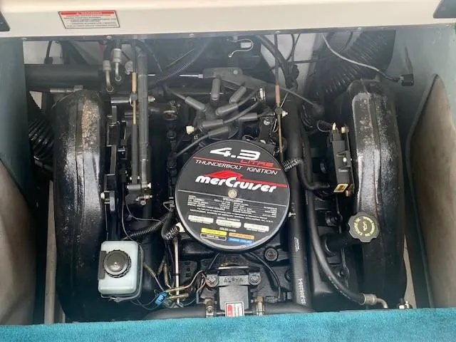 Slide: The Image of Engine compartment of a 1998 Sea Ray 185 Bow Rider with MerCruiser 4.3L engine. - 10